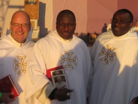 Mgr John with two friends.